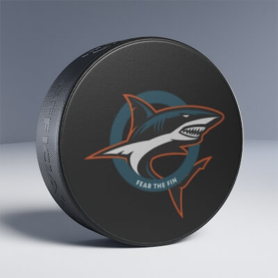 Hockey Puck With Fear The Fin Logo On It